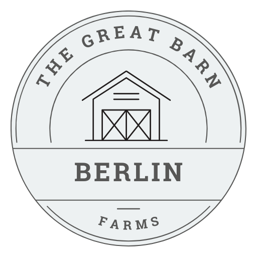 Circular logo with a barn illustration in the center, labeled "The Great Barn" at the top, "Berlin" in bold in the middle, and "Farms" at the bottom—perfect for event catering services or any premium event catering menu.